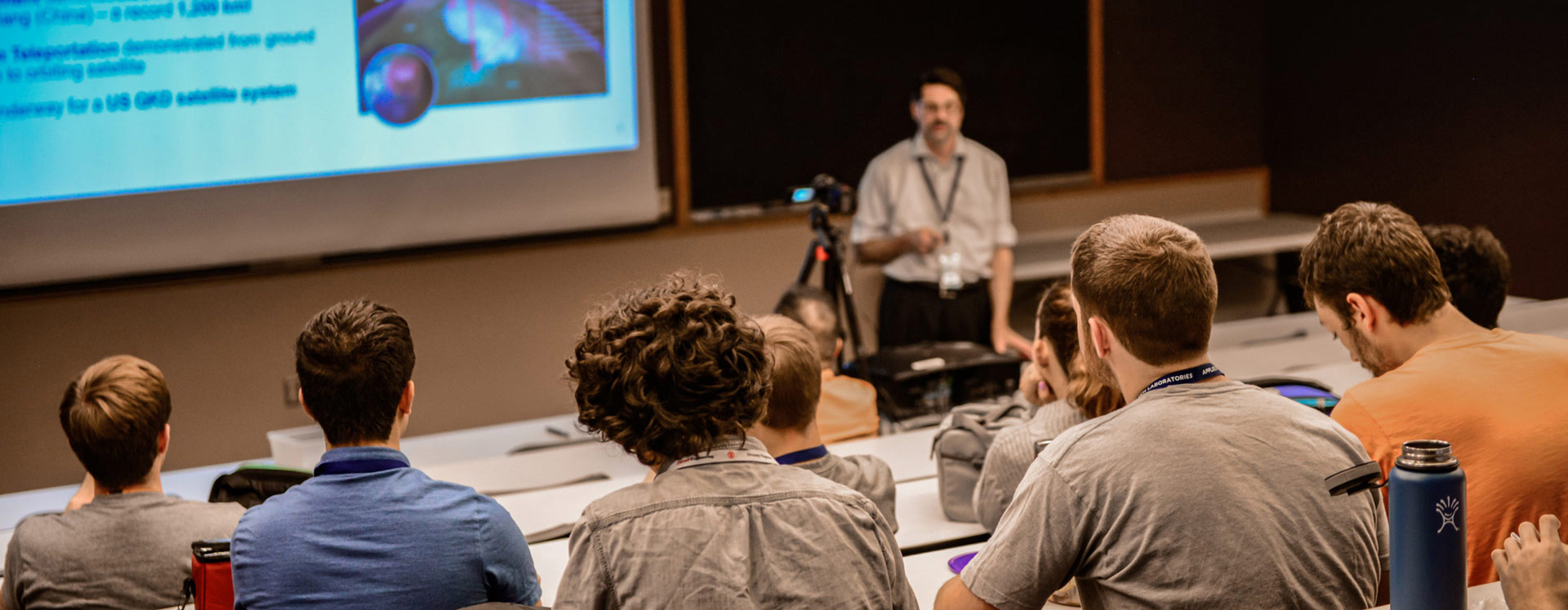 Brian La Cour presenting to an audience